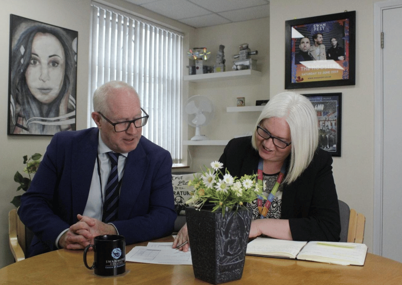 Photograph of Mr Jonathan Executive Head and Mrs Griffiths Head of School working together