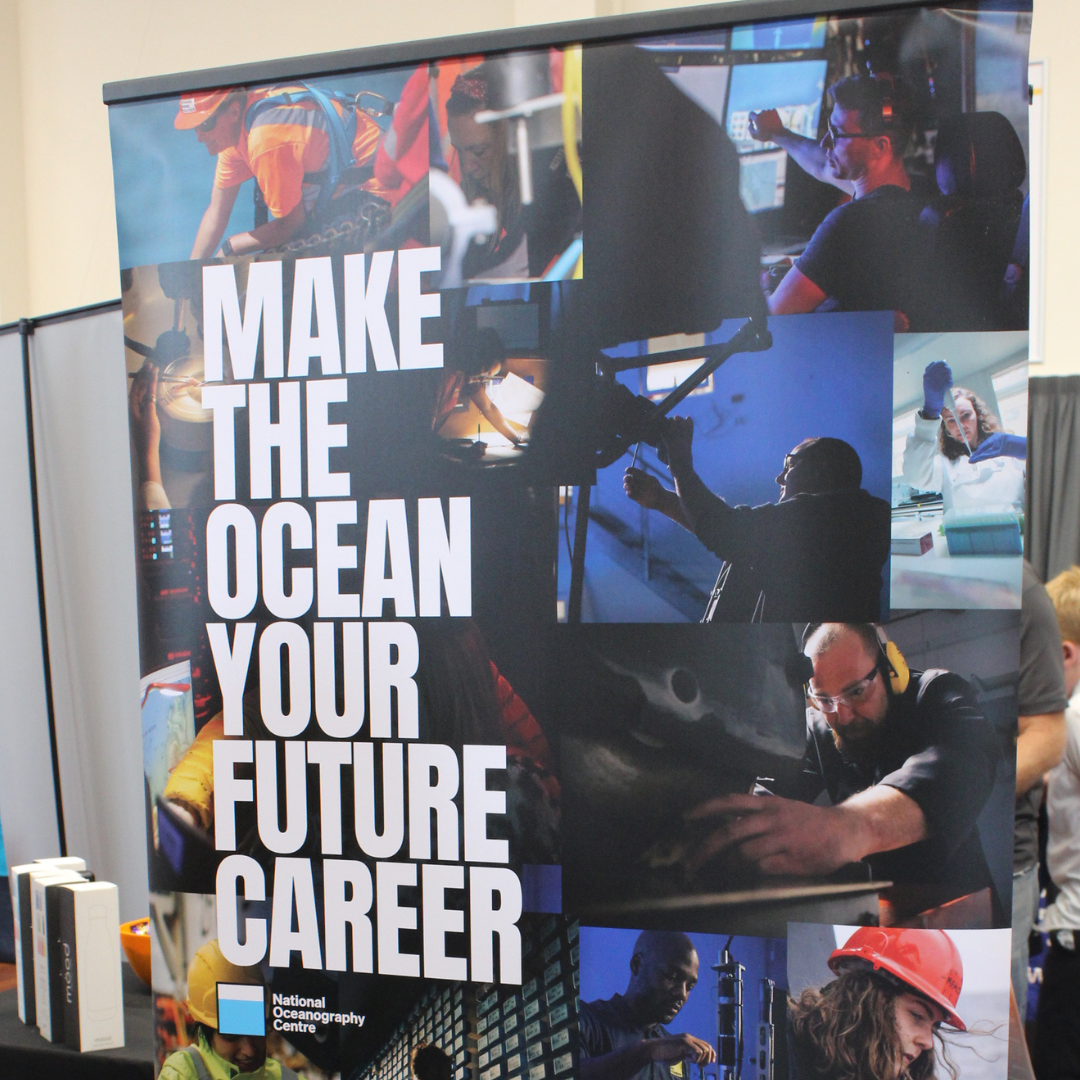 An exhibition banner for the National Oceanography Centre reading "Make The Ocean Your Future Career".