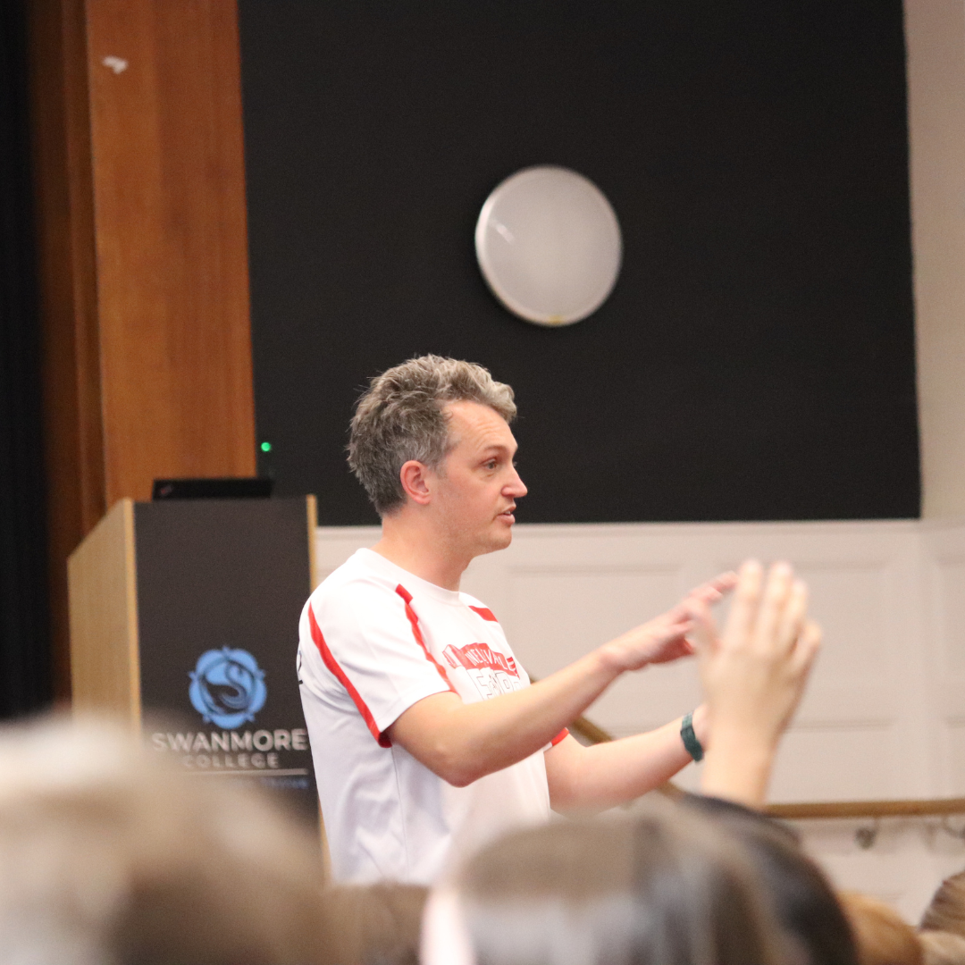Author Matt Oldfield addressing pupils in the school hall during an interactive presentation.
