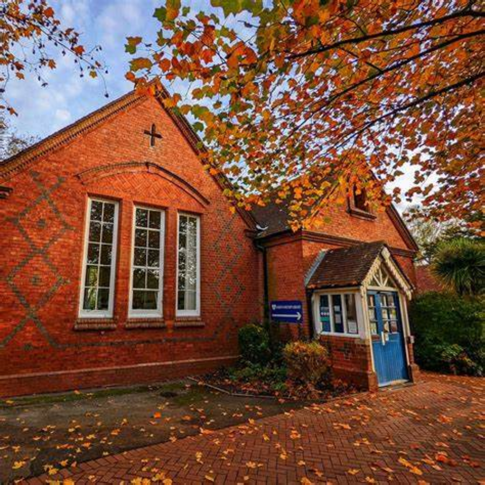 Image shows the outside of Bishops Waltham library in autumn