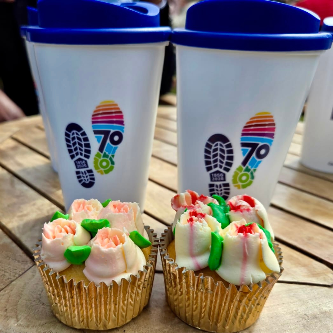 Decorative cupcakes and commemorative cups displayed at the Duke of Edinburgh’s Award 70th anniversary event.