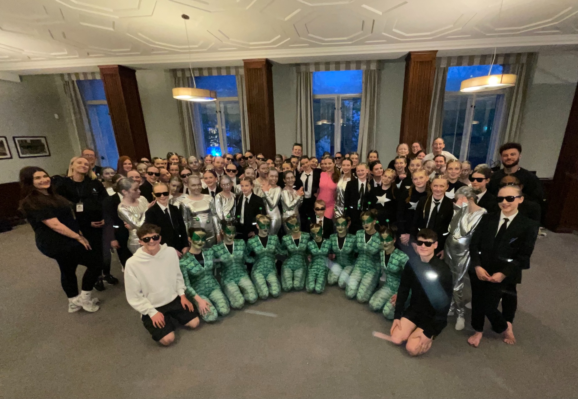 Image shows group of pupils and staff in the dressing room at the Dance Live final. 