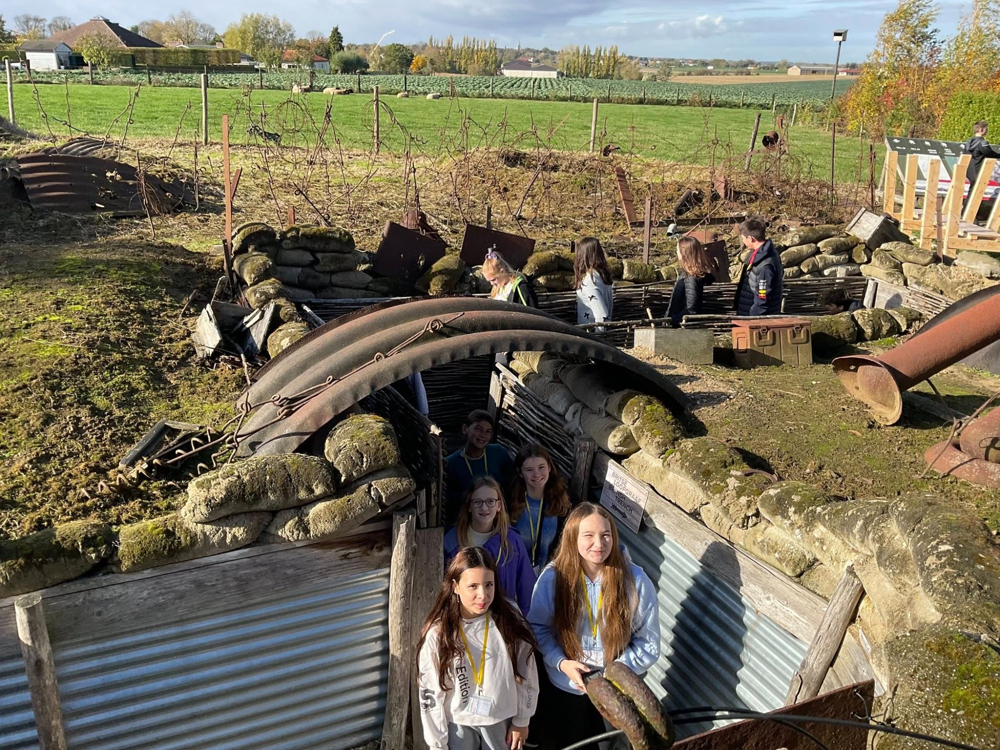 Year 8 pupils from the College exploring a reconstructed trench at the Passchendaele Museum during their battlefields trip in Belgium.