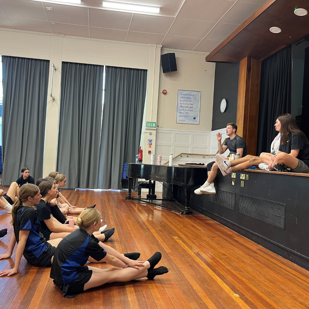 Image shows pupils listening to Richard Womersley talking about his experiences