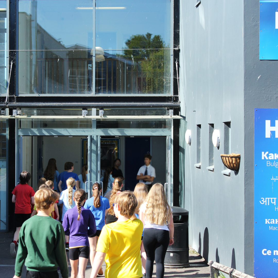 Image shows pupils walking into A block for a language taster lesson