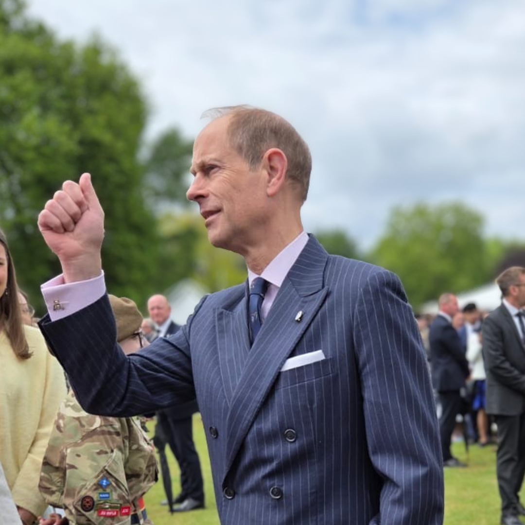 Prince Edward speaking with guests at the Duke of Edinburgh’s Award 70th anniversary celebration event.