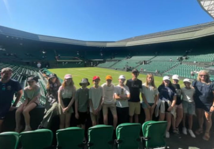 Image shows pupils and staff at Wimbledon