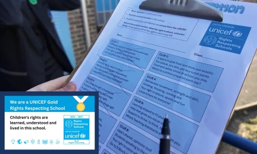 Close-up of a UNICEF Rights Respecting Schools worksheet on a clipboard. Text includes “Work together to crack each clue” and a UNICEF badge