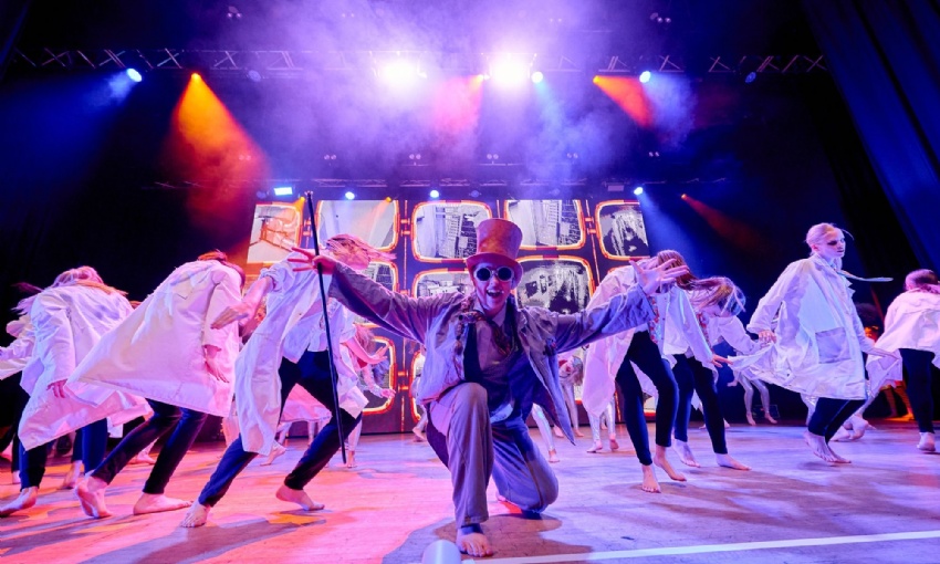 Swanmore College pupils performing a colourful Wonka-themed dance routine on stage at the 2026 Dance Live finals.