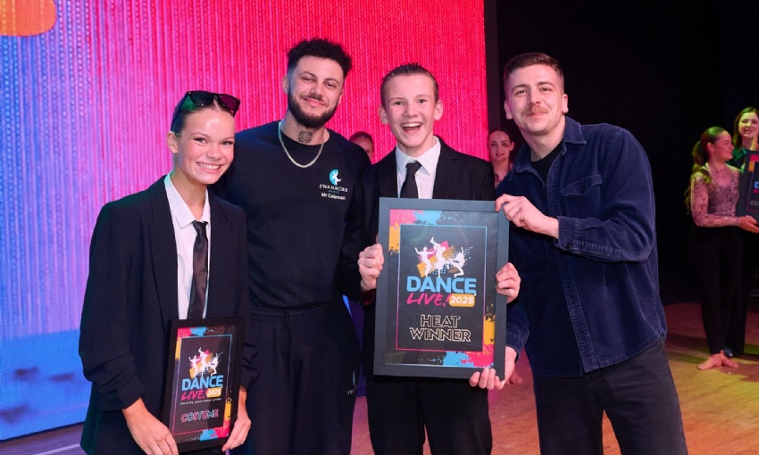 Image shows Mr Coleman and the two main agents receiving the award from Callum Bowman as winners of the heat at Portsmouth